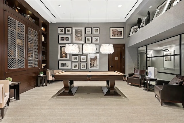 recreation room with light carpet and pool table