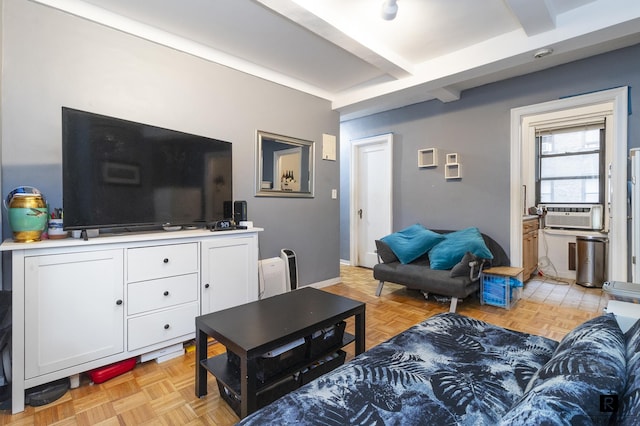 living room with beam ceiling, cooling unit, and baseboards