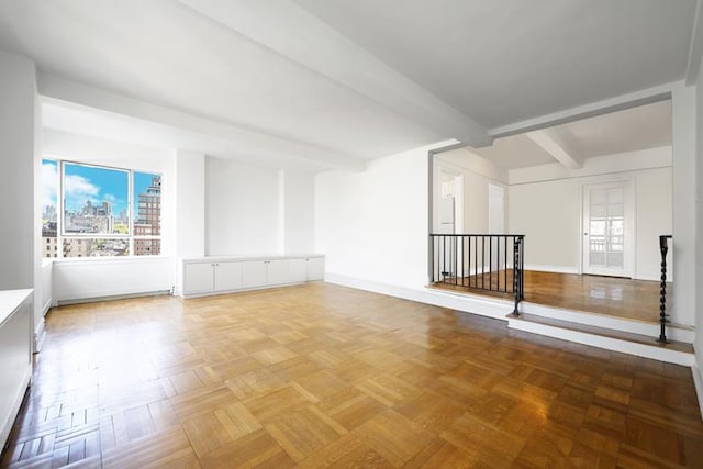 interior space with beam ceiling and parquet flooring