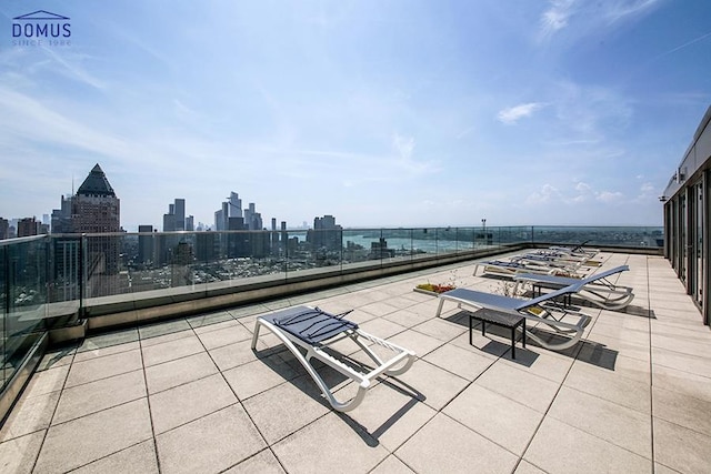 view of patio featuring a balcony