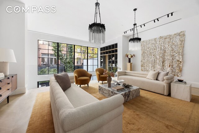 living room with a high ceiling