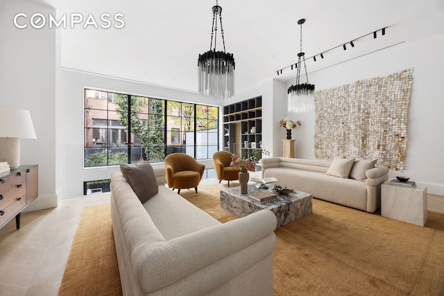 living room featuring a towering ceiling