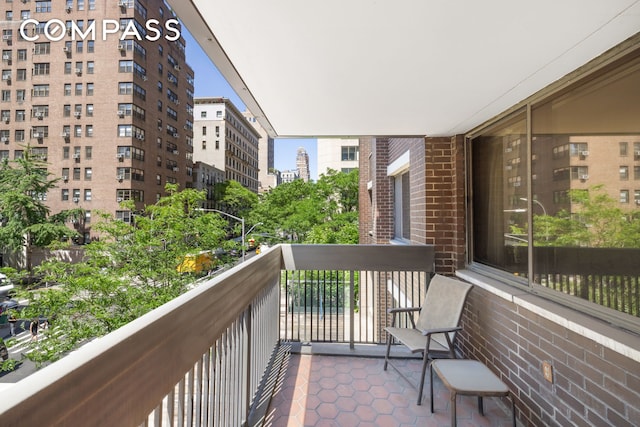 balcony featuring a view of city