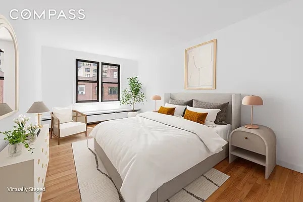 bedroom featuring light wood-style flooring