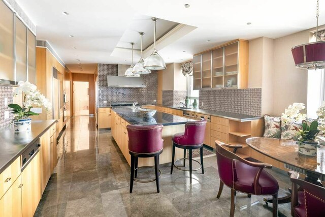 interior space featuring a water view and ornamental molding