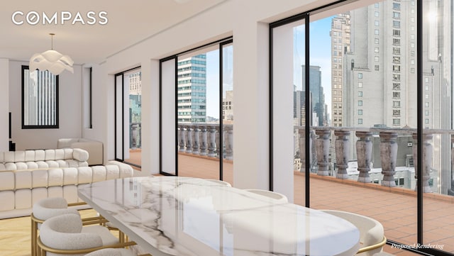 bedroom featuring a city view and access to outside