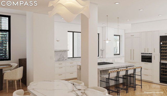 living room featuring light parquet flooring and a wealth of natural light