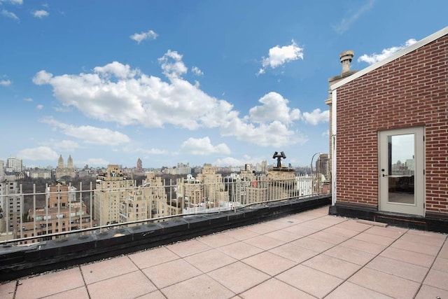 view of patio / terrace with a city view