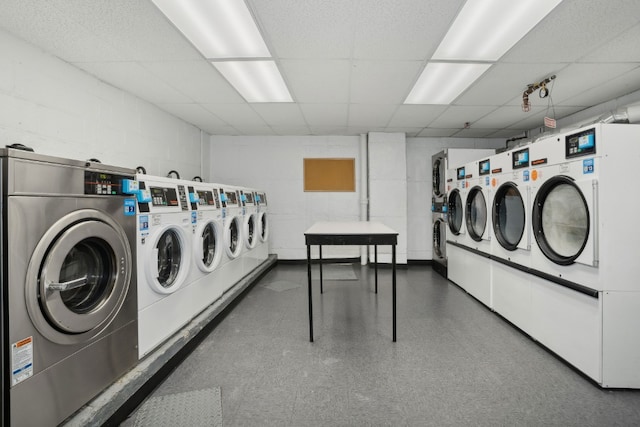 washroom featuring washer and clothes dryer