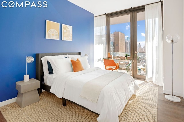 bedroom featuring hardwood / wood-style flooring