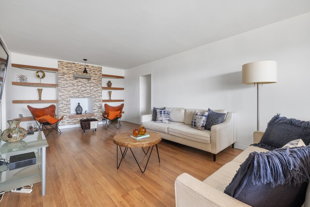 1020 Grand Concourse Unit 20C, New York City, NY 10452 - living room featuring light wood-style floors and built in shelves