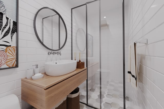 bathroom with sink, tile walls, and walk in shower