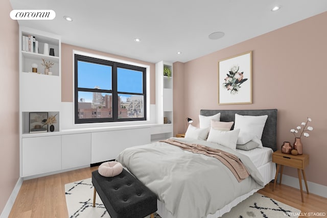 bedroom featuring wood finished floors, recessed lighting, baseboards, and visible vents