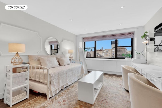 bedroom with light hardwood / wood-style floors