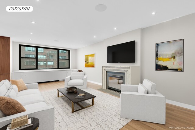 bedroom with light hardwood / wood-style flooring