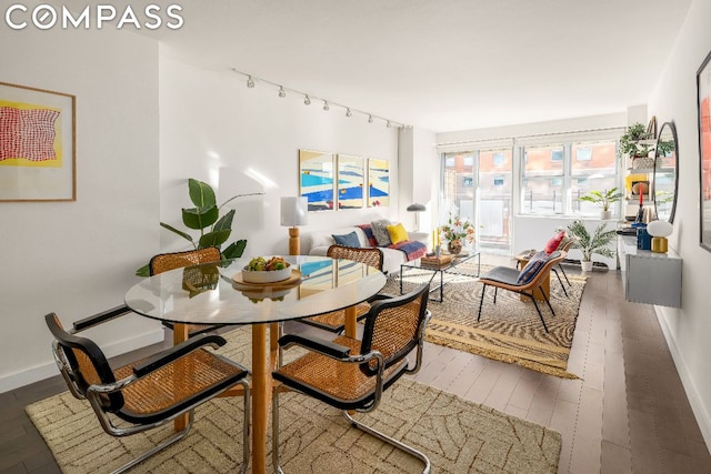 dining room with hardwood / wood-style floors