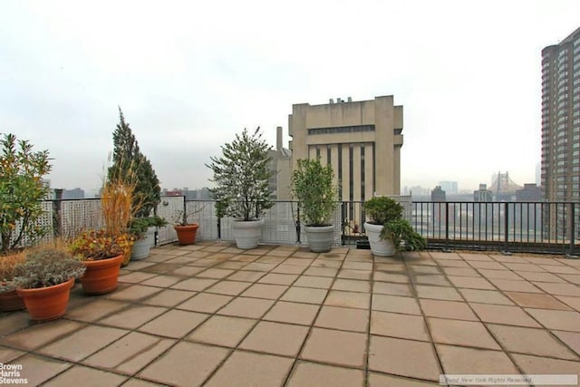 view of patio / terrace with a city view