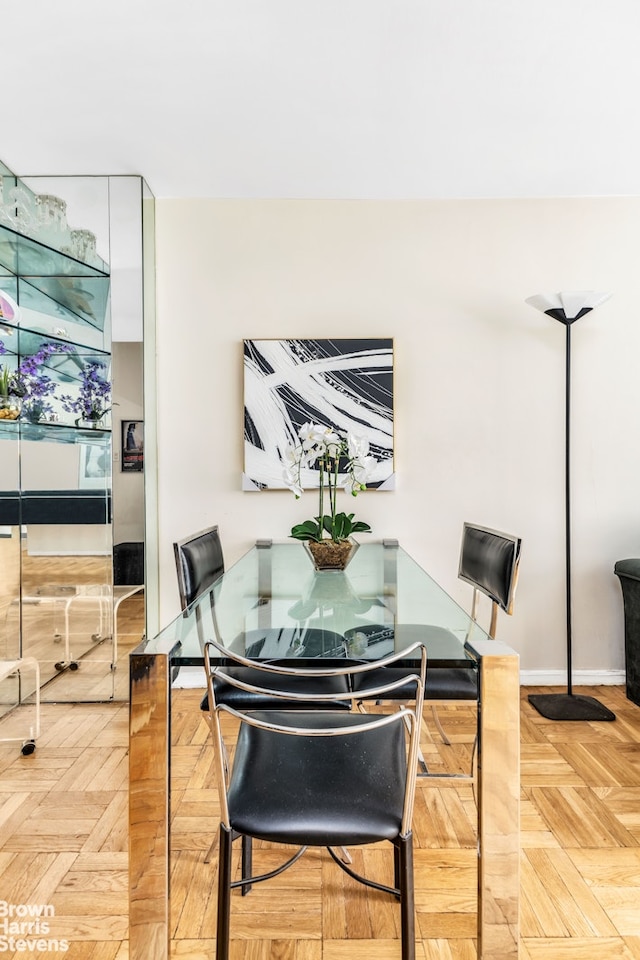 dining room with baseboards