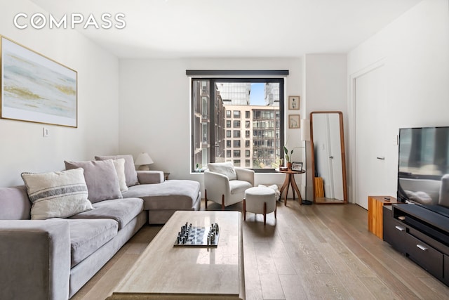 living area with light wood-style floors