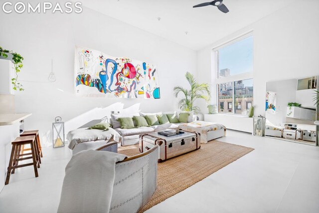 living room with ceiling fan