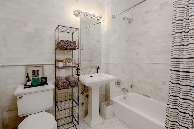 108 W 138th St Unit 2B, New York City, NY 10030 - bathroom featuring toilet, shower / tub combo, tile walls, and tile patterned floors