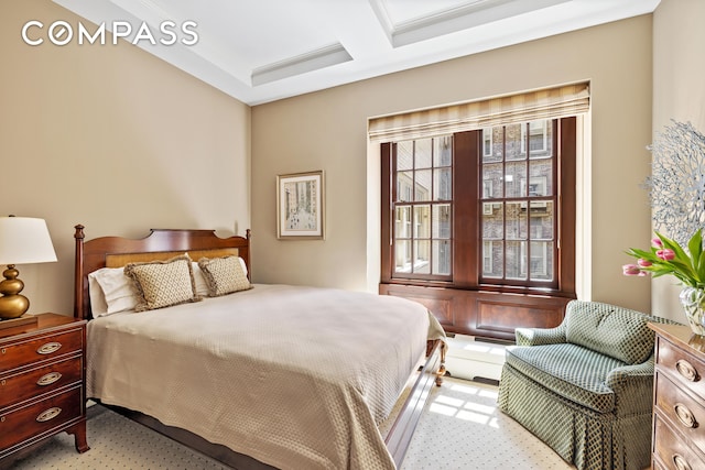 bedroom featuring coffered ceiling