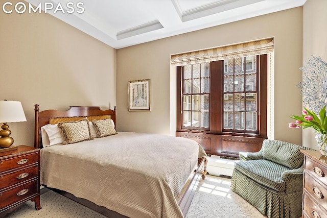 bedroom with coffered ceiling