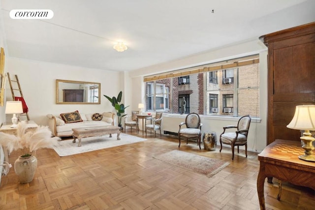 sitting room featuring light parquet floors