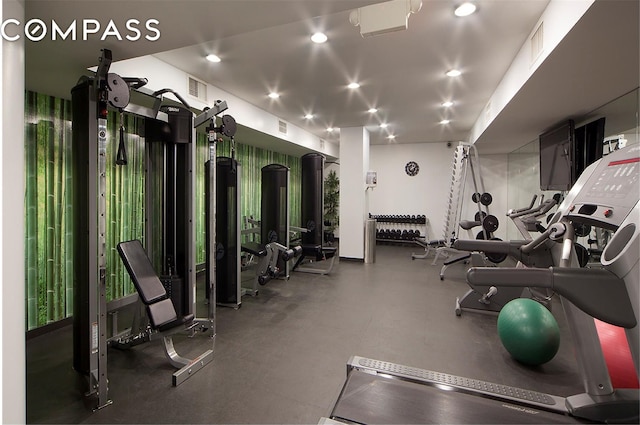 exercise room with visible vents and recessed lighting