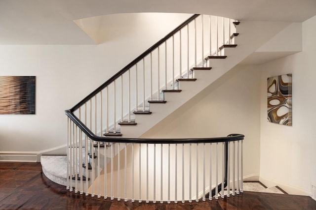 stairway featuring a wealth of natural light