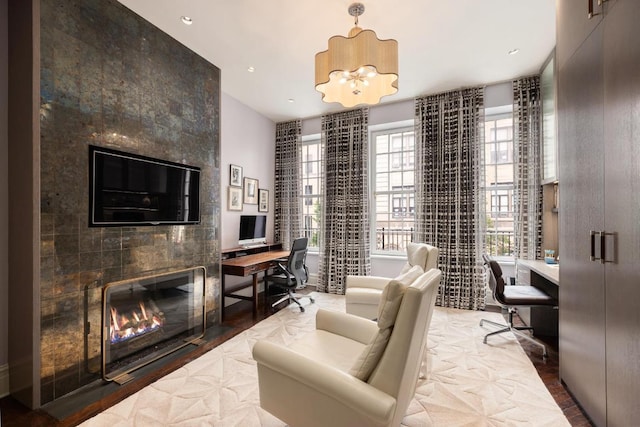 office featuring a tile fireplace