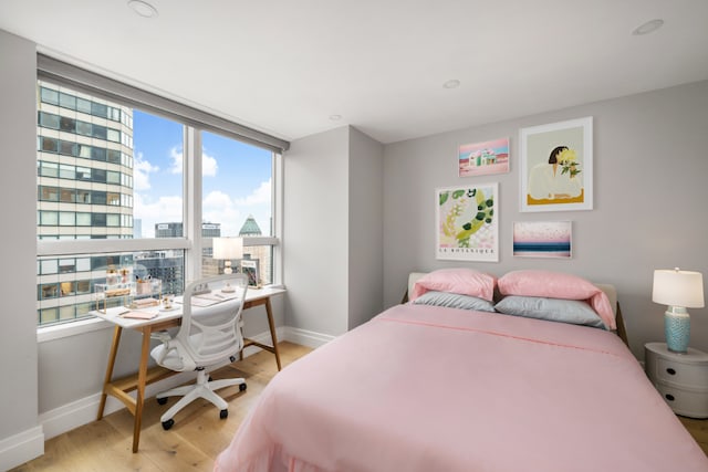 bedroom featuring light hardwood / wood-style flooring