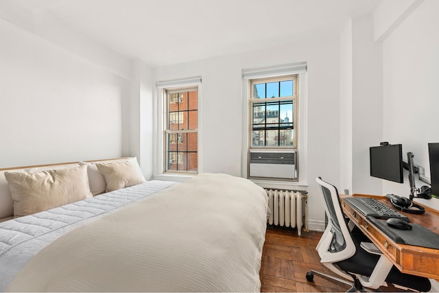 bedroom with cooling unit and radiator