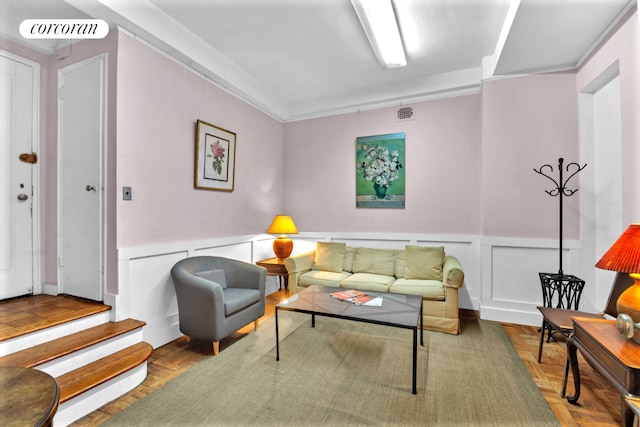 living room featuring parquet floors