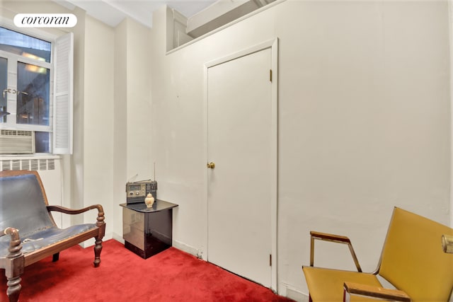 living area with carpet flooring