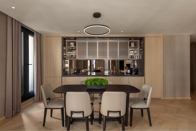dining space with recessed lighting