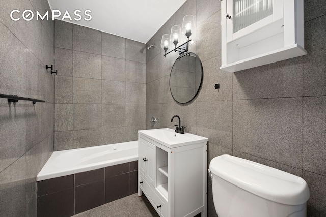336 Convent Avenue Mltfmly, New York City, NY 10031 - bathroom featuring tile walls, vanity, and tiled shower / bath combo
