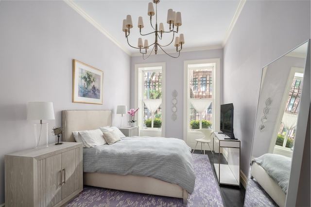 bedroom with a notable chandelier, crown molding, baseboards, and dark wood-style flooring