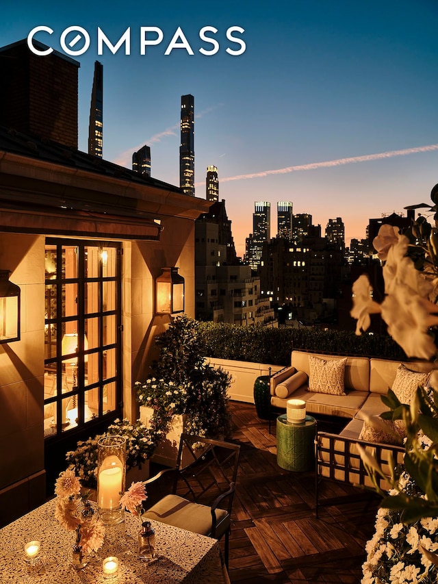 view of patio featuring a city view and outdoor lounge area