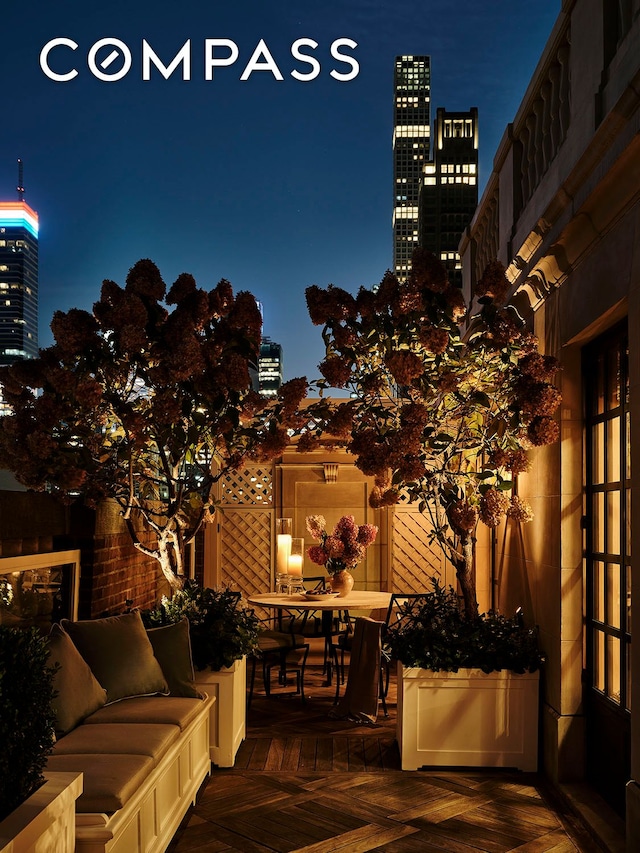 exterior space with a view of city lights