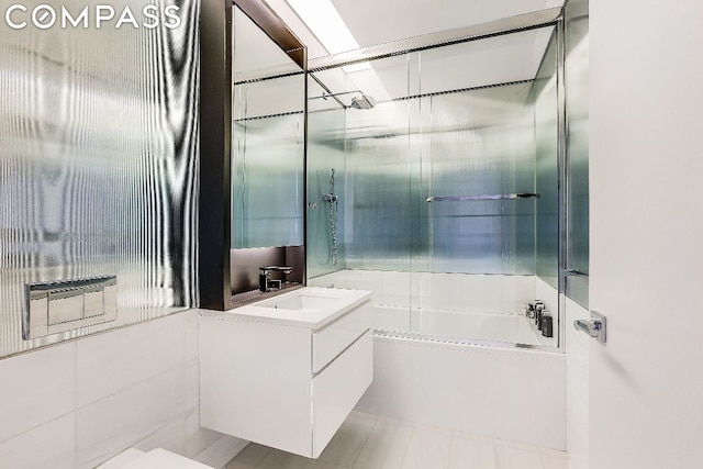 bathroom featuring shower / bathing tub combination and vanity