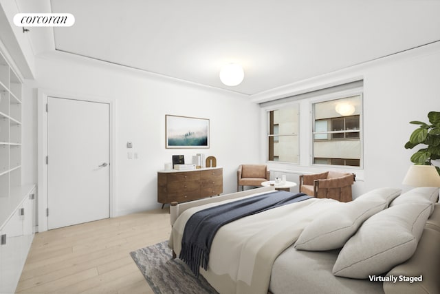 bedroom featuring light wood-type flooring