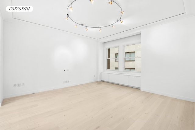 unfurnished living room featuring light hardwood / wood-style floors