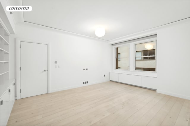 empty room featuring light hardwood / wood-style floors