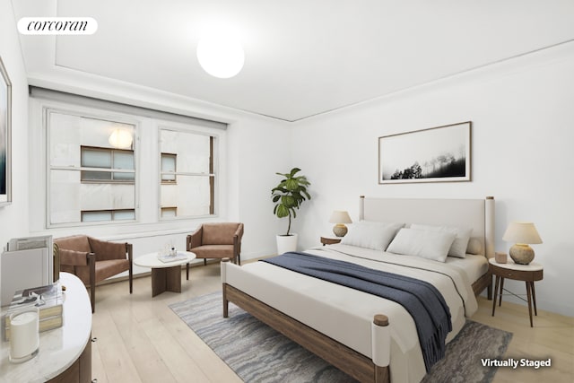 bedroom with light hardwood / wood-style floors