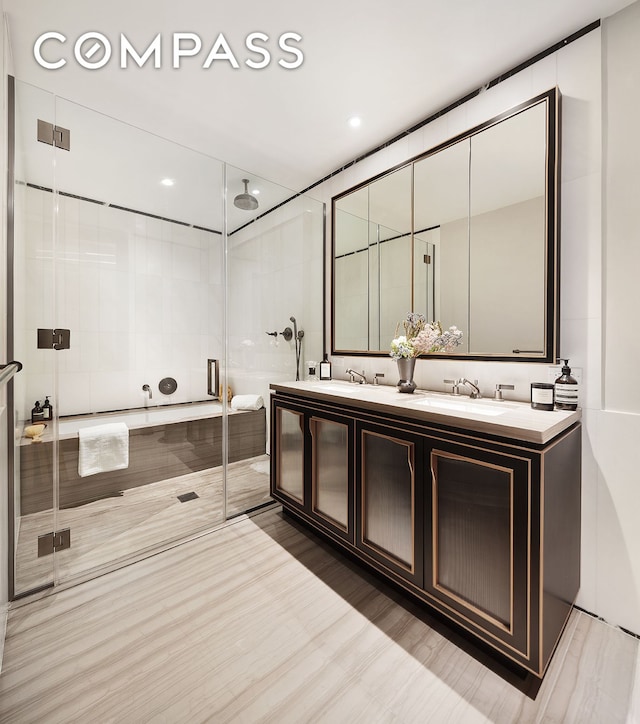 51 Jay St Phe, Phe, New York City, NY 11201 - bathroom featuring double vanity, a shower stall, wood finished floors, and recessed lighting