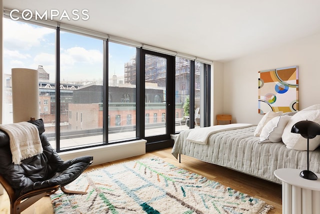 bedroom with wood finished floors