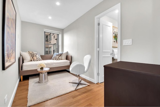 sitting room featuring light hardwood / wood-style floors