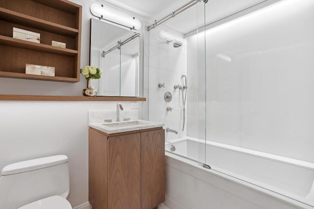 full bathroom with vanity, shower / bath combination with glass door, and toilet