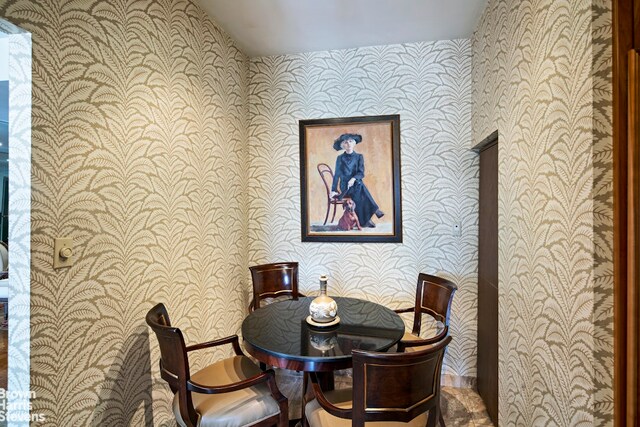 425 E 58th St Unit 14D, New York City, NY 10022 - dining area featuring wallpapered walls